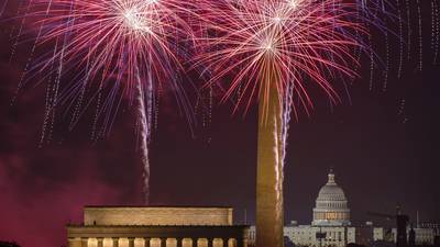 Fireworks light up the skies across the US as Americans endure searing heat to celebrate July Fourth