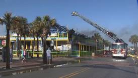 ‘Landmark’ New Smyrna Beach tiki bar damaged by fire