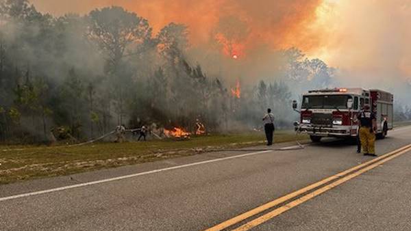 Crews continue to battle brush fire in Volusia County