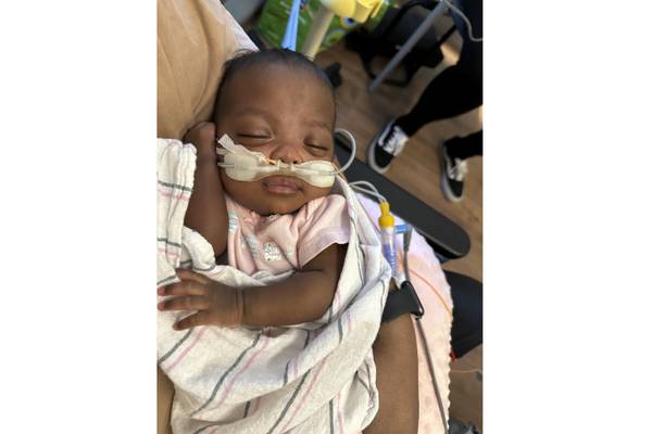 `Micropreemie' baby who weighed just over 1 pound at birth goes home from Illinois hospital