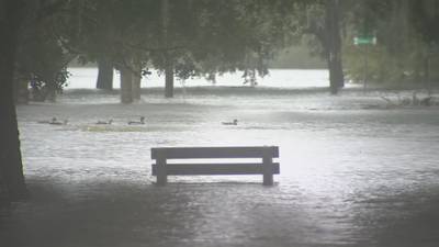 2 Orlando lakes flood into each other due to heavy rain from Hurricane Ian