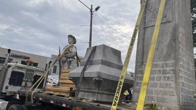 A Mississippi town moves a Confederate monument that became a shrouded eyesore