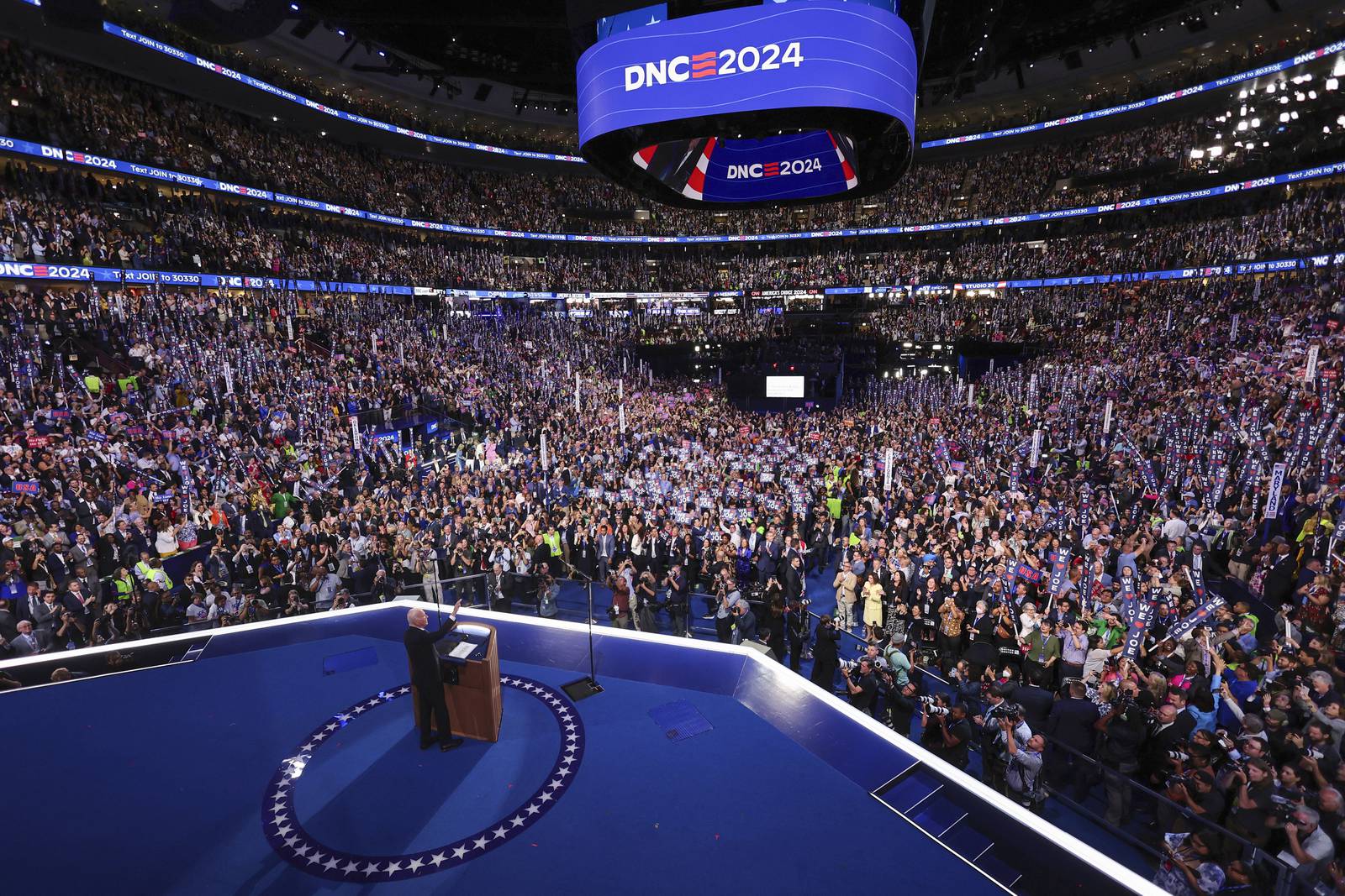 Biden gets a rousing ovation from Democrats as he gives Harris an