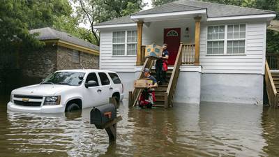 The Latest: Tropical Storm Debby hovers off the coast of the Carolinas