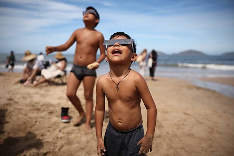 People watching the solar eclipse