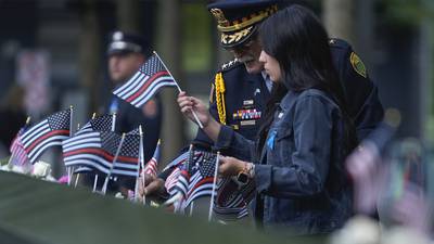 US commemorates 9/11 attacks with victims in focus, but politics in view