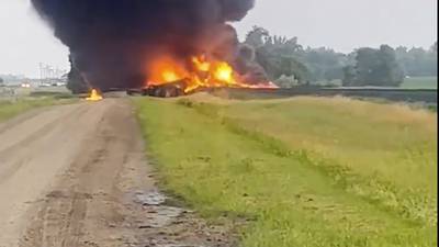 Rail cars carrying hazardous material derail and catch fire in North Dakota
