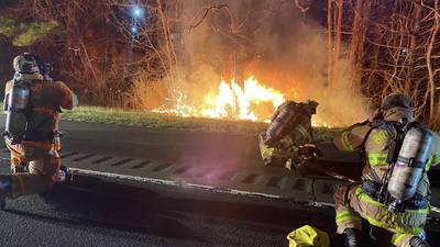 Off-duty firefighter saves woman from burning car after crash in Connecticut