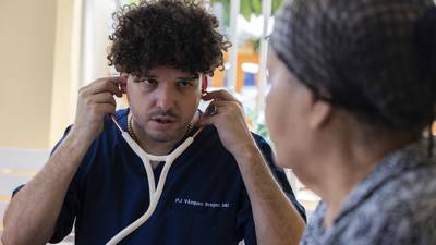 As doctors leave Puerto Rico in droves, a rapper tries to fill the gaps
