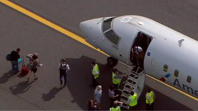 Passenger jet evacuated on taxiway at Charlotte Douglas International Airport
