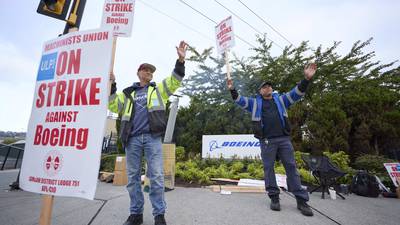 Boeing works to conserve cash as 33,000 factory workers go on strike