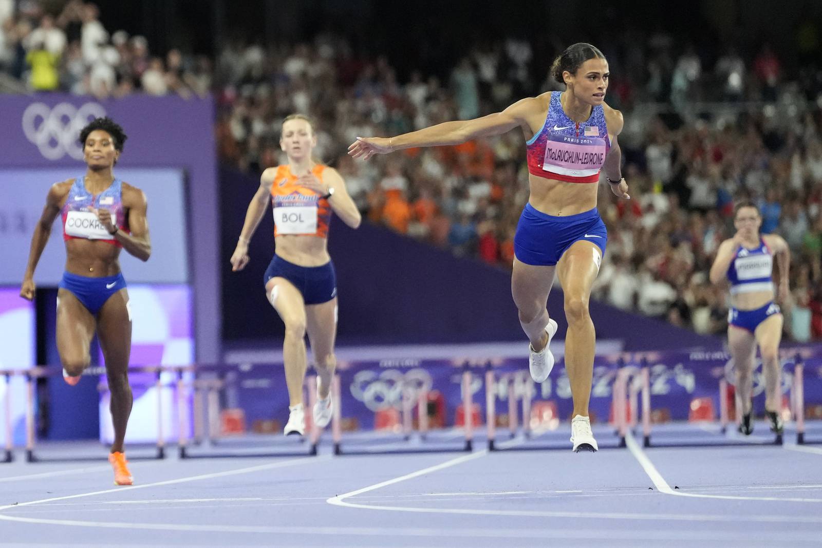 Sydney McLaughlinLevrone breaks her own world record, wins Olympic