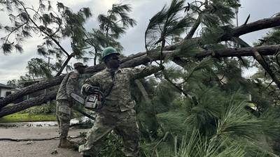 Francine weakens moving inland as the storm leaves behind flooding and widespread power outages