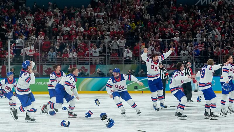 Hughes scores in overtime as US beats Canada for first men's hockey gold at the Olympics since 1980