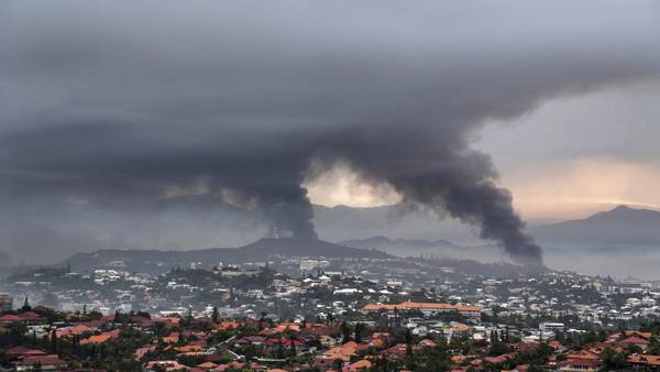 New Caledonia reopening its international airport and shortening curfew as unrest continues to ebb